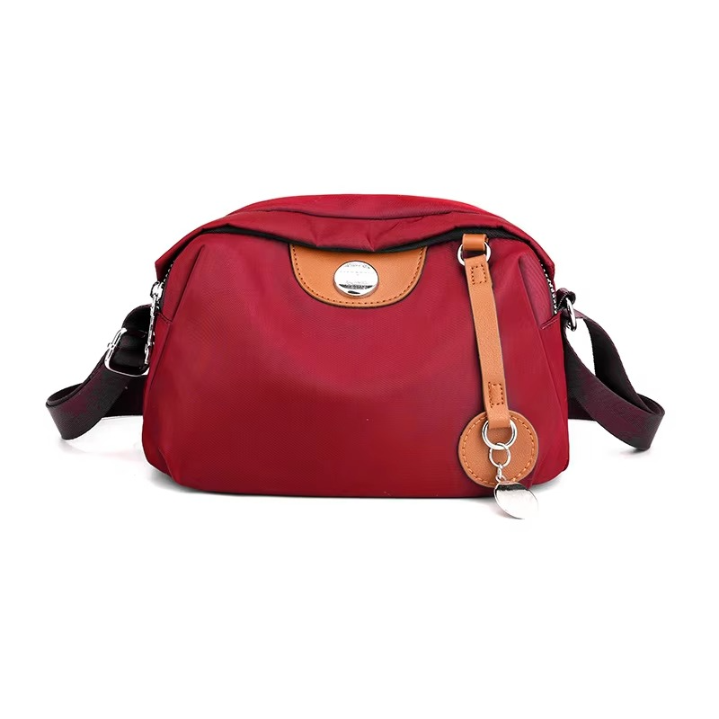 Trendy Red Nylon Casual Travel Messenger Bag – Waterproof Lightweight Multifunctional Mini Crossbody Bag with Compact Storage & Durable Design (22x11x14 cm) - Image 2